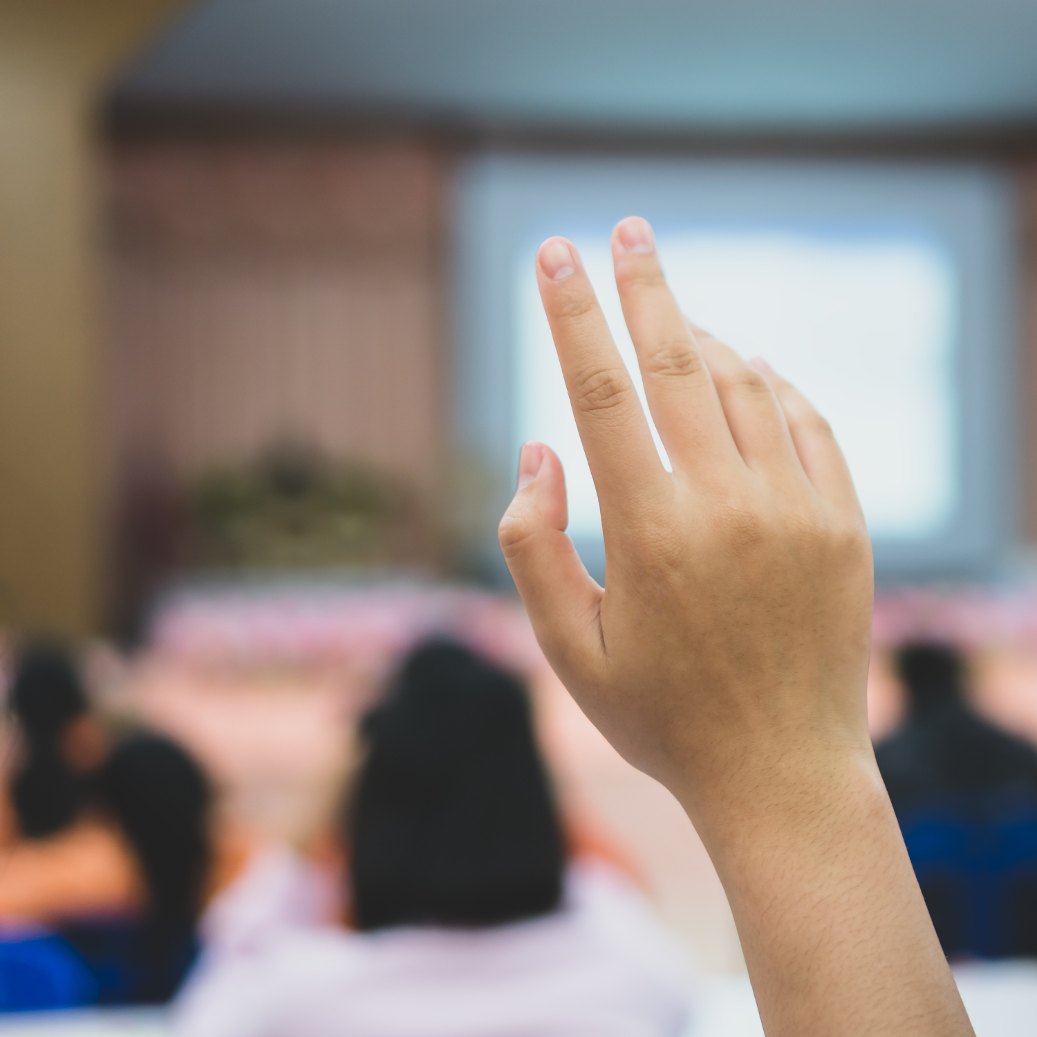 hand raised at an event