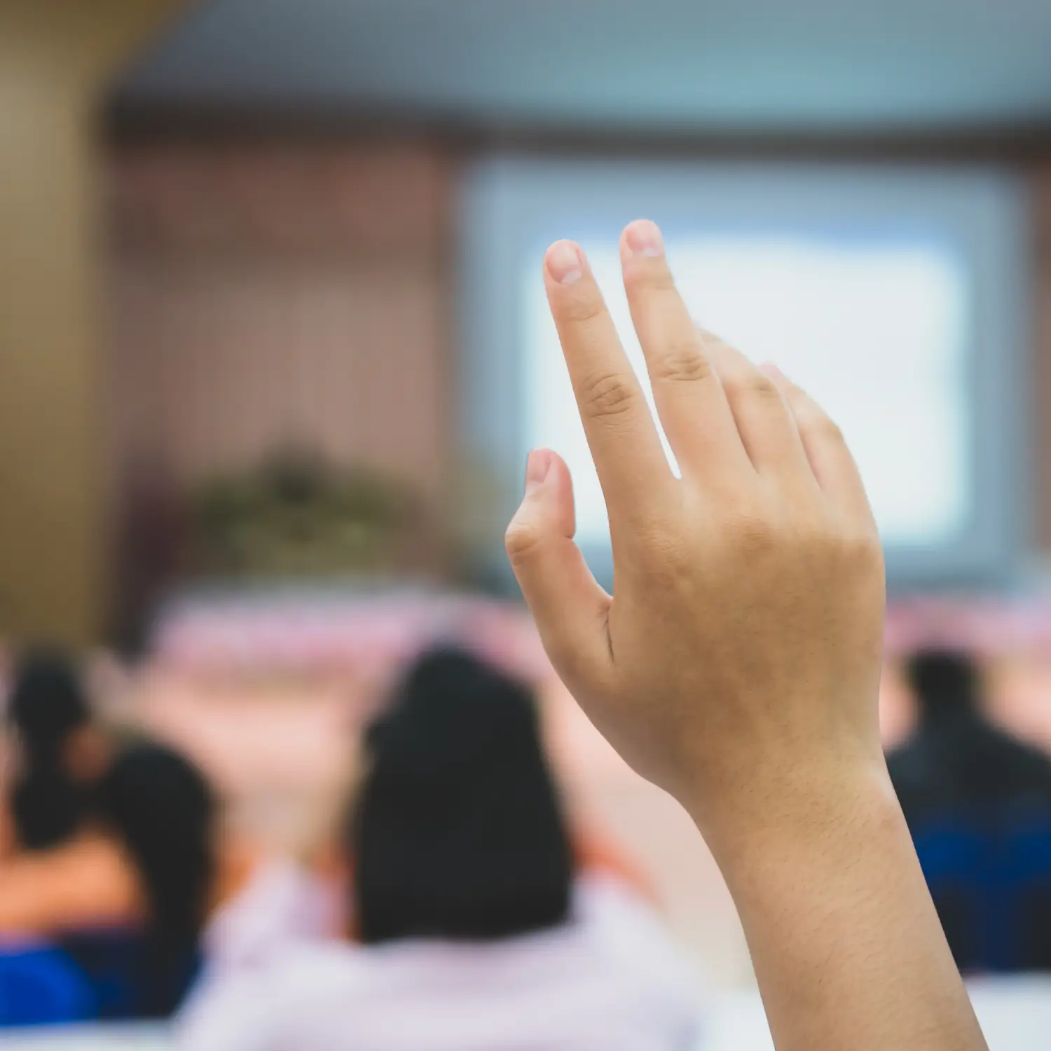 hand raised at an event